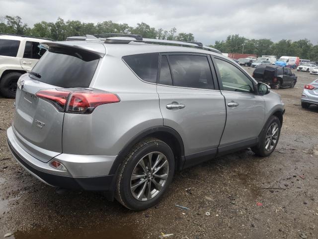 Photo 3 from auction – 2018 TOYOTA RAV4 with VIN JTMDFREV2JJ223564