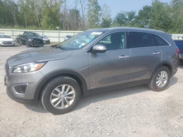 KIA SORENTO LX 2016 with VIN 5XYPGDA32GG134507 - Photo from auction