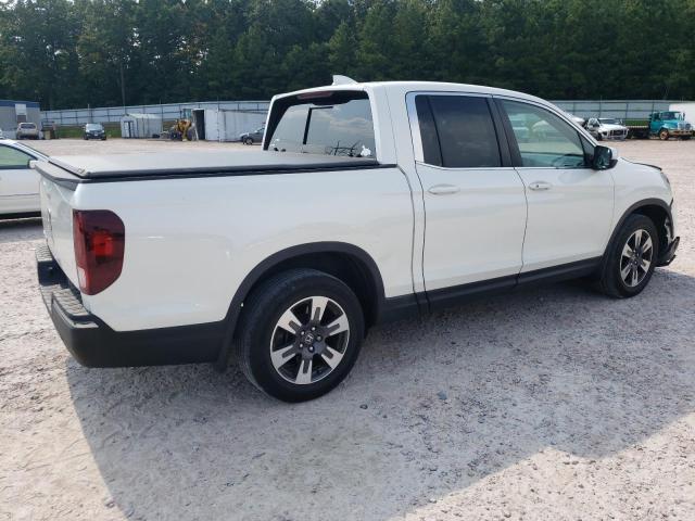 Photo 3 from auction – 2019 HONDA RIDGELINE with VIN 5FPYK2F58KB001324