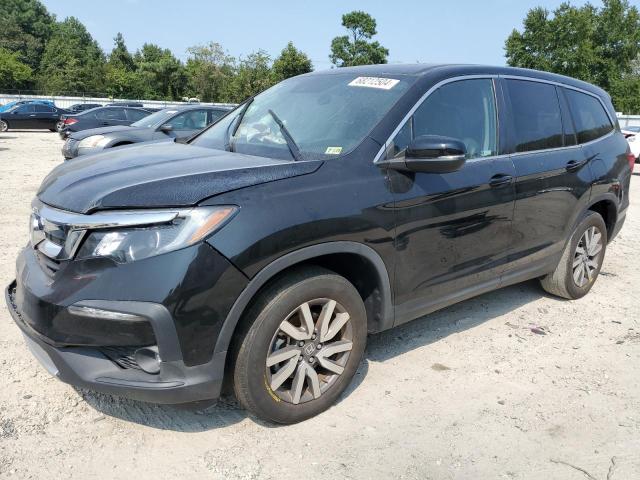 HONDA PILOT EXL 2021 with VIN 5FNYF5H53MB035007 - Photo from auction