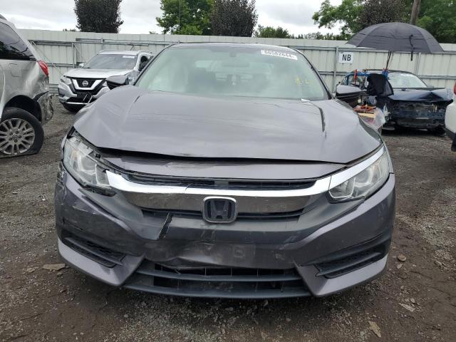 Photo 5 from auction – 2018 HONDA CIVIC LX with VIN 2HGFC2E54JH567487