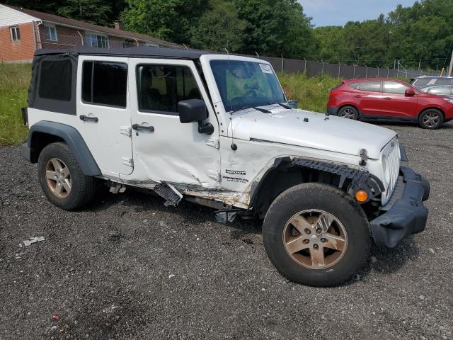 Photo 4 from auction – 2013 JEEP WRANGLER U with VIN 1C4BJWDGXDL583133