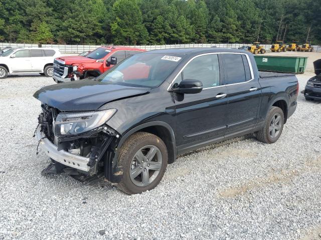 Photo 1 from auction – 2023 HONDA RIDGELINE with VIN 5FPYK3F78PB046732