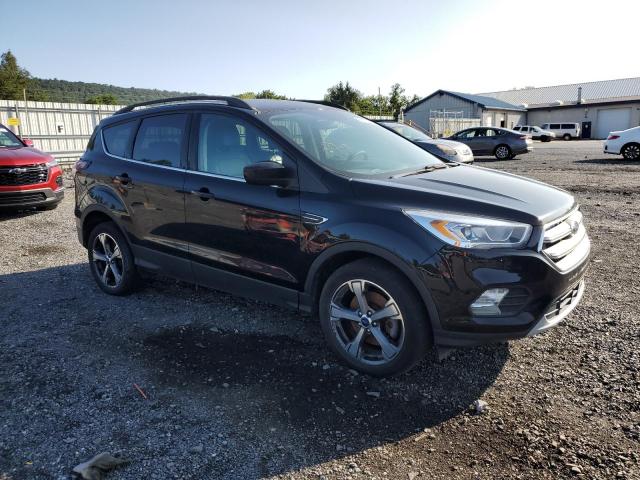 Photo 4 from auction – 2017 FORD ESCAPE SE with VIN 1FMCU9GD7HUC98495