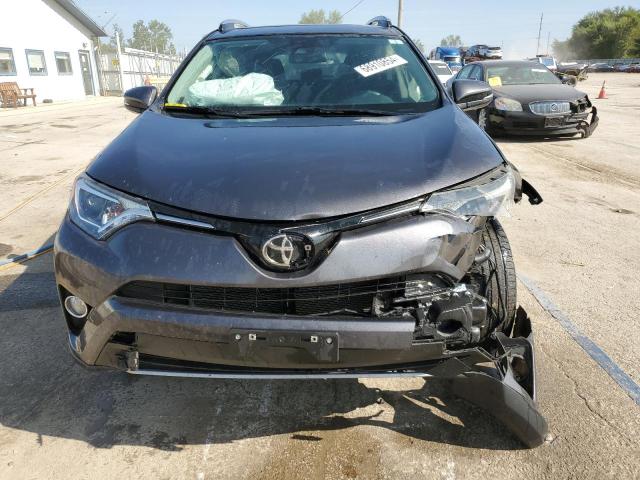 Photo 5 from auction – 2017 TOYOTA RAV4 XLE with VIN JTMRFREV5HJ141568