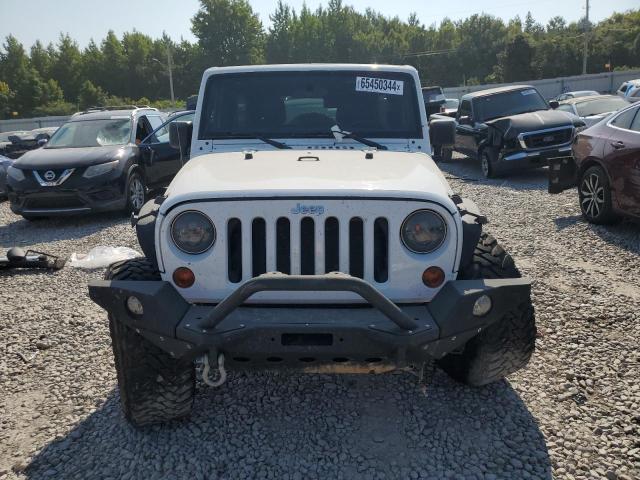 Photo 5 from auction – 2011 JEEP WRANGLER U with VIN 1J4BA3H12BL626472