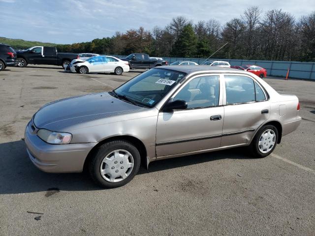 TOYOTA COROLLA 1999 with VIN 2T1BR12E3XC207057 - Photo from auction