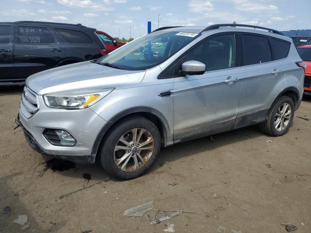 FORD ESCAPE SE 2018 with VIN 1FMCU0GD1JUA40975 - Photo from auction