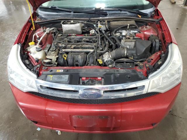 Photo 11 from auction – 2009 FORD FOCUS S with VIN 1FAHP34N09W116403