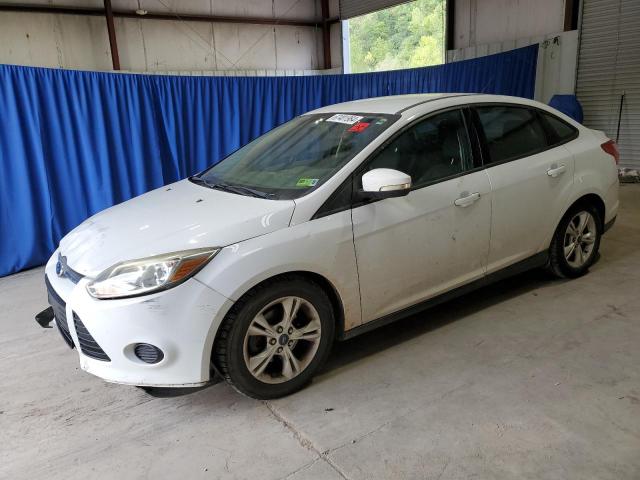 FORD FOCUS SE 2014 with VIN 1FADP3F20EL336332 - Photo from auction