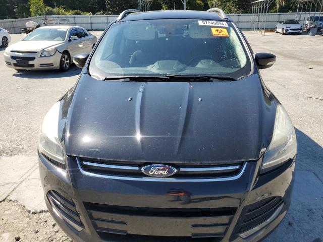 Photo 11 from auction – 2016 FORD ESCAPE TIT with VIN 1FMCU0J98GUC72843