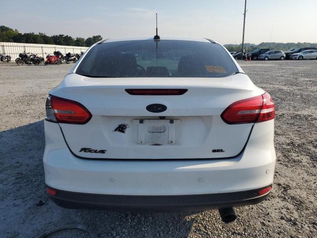 Foto 6 de la subasta – 2017 FORD FOCUS SEL con VIN 1FADP3H20HL247152