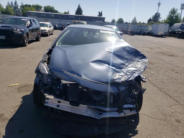 Photo 5 from auction – 2021 TOYOTA COROLLA LE with VIN JTDEPMAE6MJ140587
