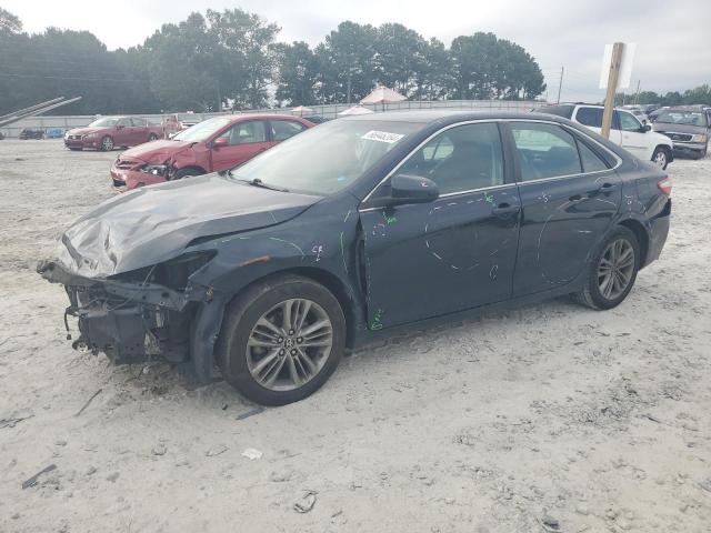 TOYOTA CAMRY LE 2017 with VIN 4T1BF1FKXHU304846 - Photo from auction