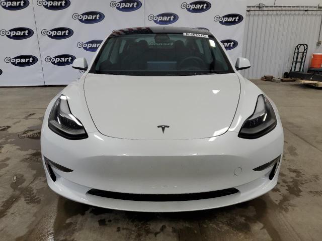 Photo 5 from auction – 2023 TESLA MODEL 3 with VIN 5YJ3E1EA7PF582454