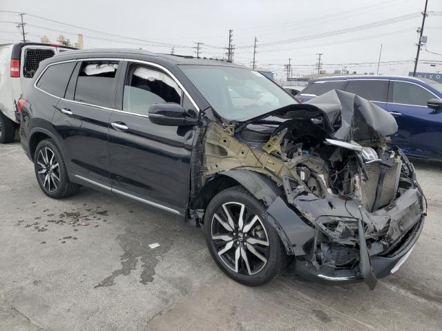 Photo 4 from auction – 2019 HONDA PILOT TOUR with VIN 5FNYF5H97KB005671