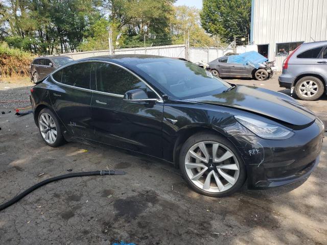 Photo 4 from auction – 2018 TESLA MODEL 3 with VIN 5YJ3E1EB9JF086524