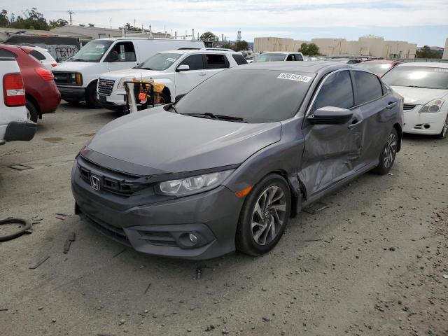 HONDA CIVIC EX 2017 with VIN 19XFC2F72HE219532 - Photo from auction