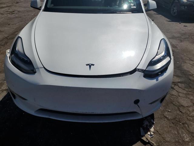 Photo 11 from auction – 2021 TESLA MODEL Y with VIN 5YJYGDED8MF112974
