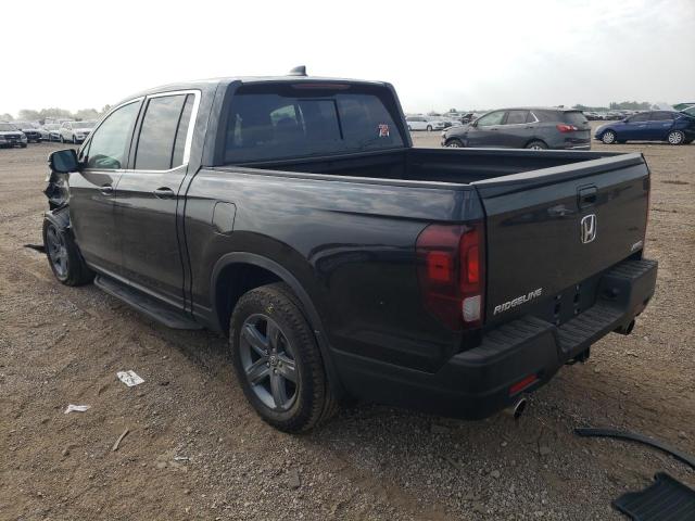 Photo 2 from auction – 2023 HONDA RIDGELINE with VIN 5FPYK3F58PB010196