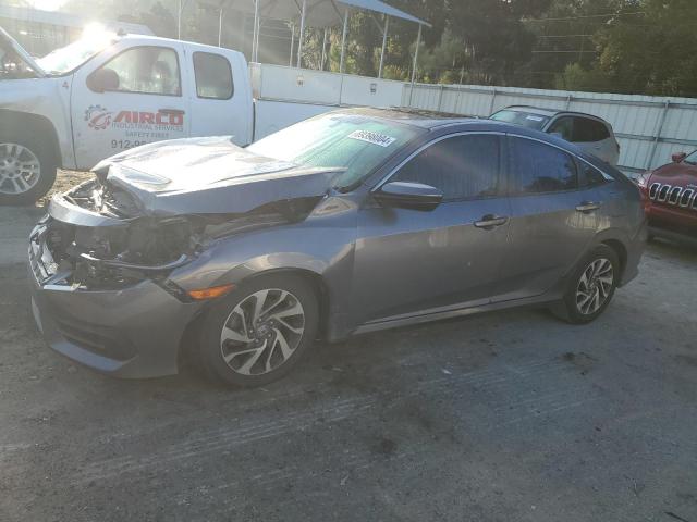 HONDA CIVIC EX 2017 with VIN 19XFC2F71HE081627 - Photo from auction