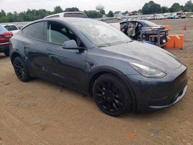 Photo 4 from auction – 2023 TESLA MODEL Y with VIN 7SAYGDEE2PF695946