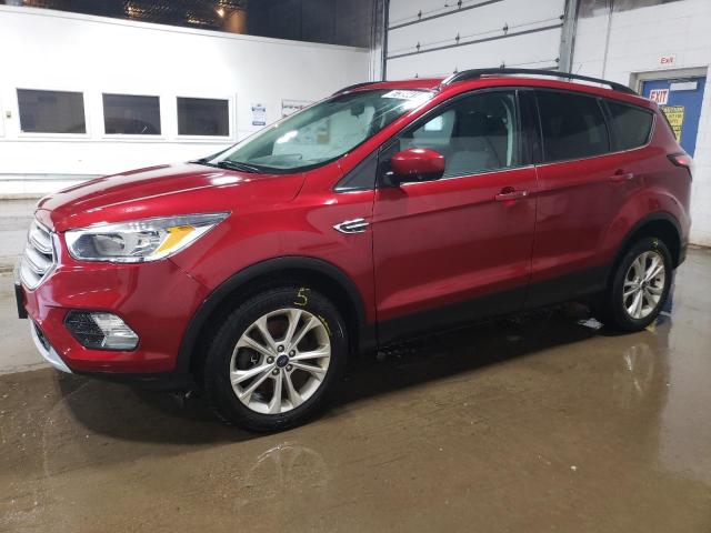 FORD ESCAPE SE 2018 with VIN 1FMCU9GDXJUC98559 - Photo from auction