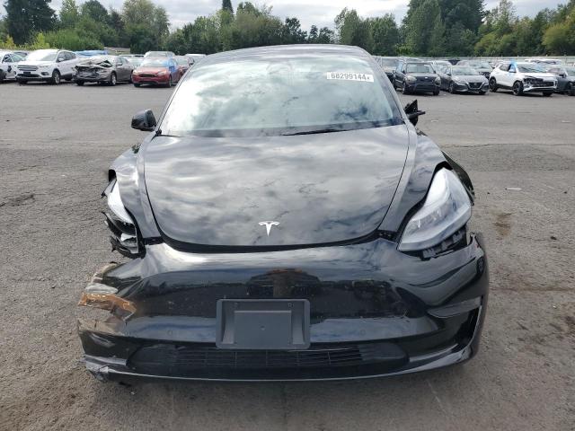 Photo 5 from auction – 2022 TESLA MODEL 3 with VIN 5YJ3E1EA1NF190518