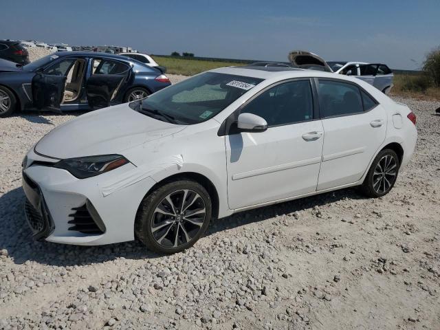 TOYOTA COROLLA L 2017 with VIN 5YFBURHE3HP613054 - Photo from auction