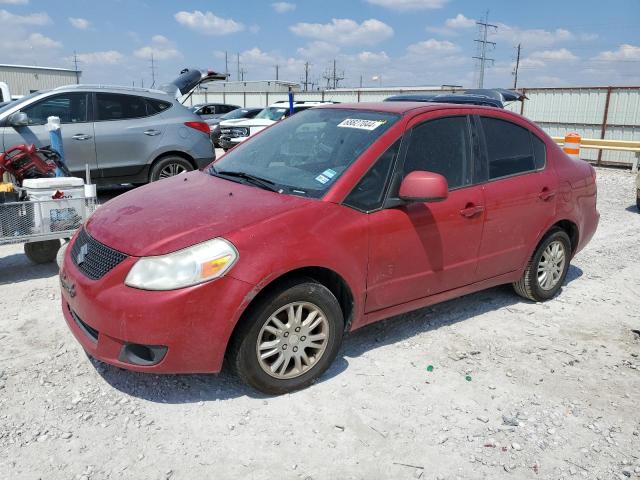 SUZUKI SX4 LE 2012 with VIN JS2YC5A36C6304263 - Photo from auction