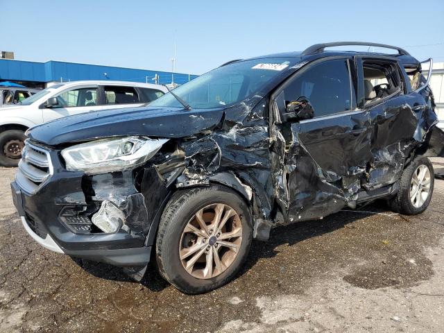 FORD ESCAPE SE 2017 with VIN 1FMCU9G9XHUC36021 - Photo from auction
