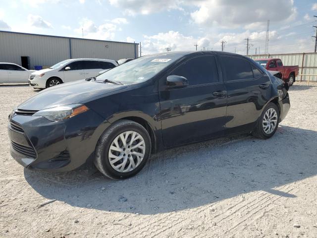 TOYOTA COROLLA L 2018 with VIN 5YFBURHE5JP853647 - Photo from auction