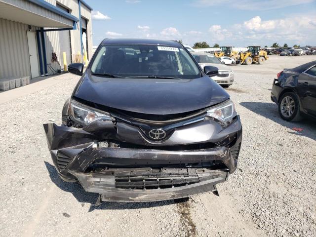 Photo 5 from auction – 2018 TOYOTA RAV4 LE with VIN JTMBFREV7JJ226533