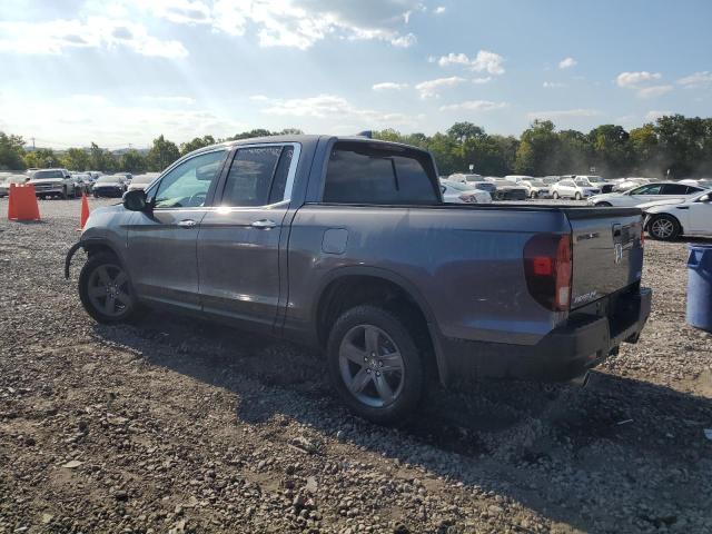 Photo 2 from auction – 2022 HONDA RIDGELINE with VIN 5FPYK3F7XNB032182