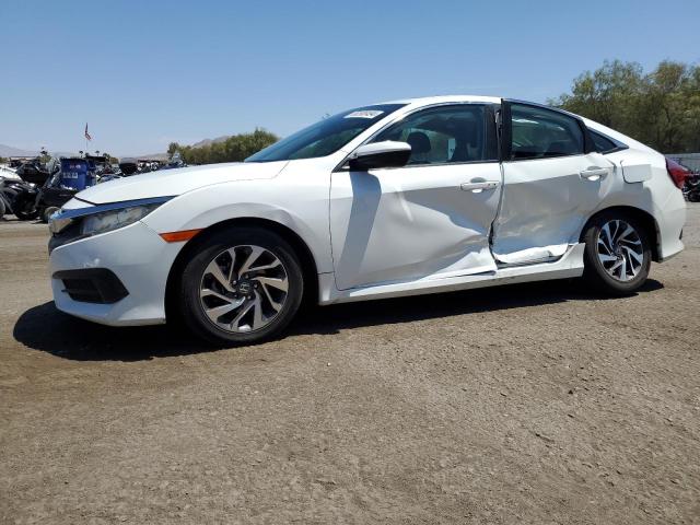 HONDA CIVIC EX 2017 with VIN 2HGFC2F7XHH505604 - Photo from auction
