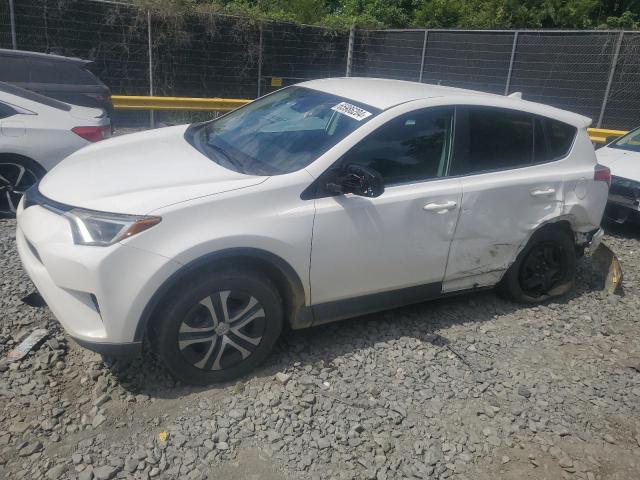 TOYOTA RAV4 LE 2018 with VIN 2T3BFREVXJW744301 - Photo from auction