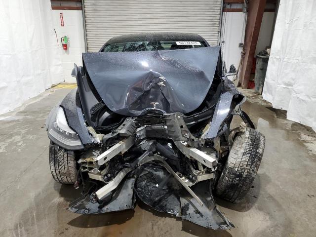 Photo 5 from auction – 2020 TESLA MODEL 3 with VIN 5YJ3E1EBXLF663614