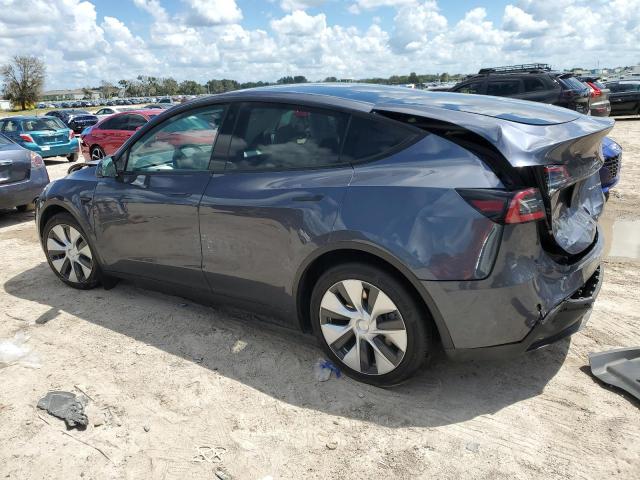 Photo 2 from auction – 2023 TESLA MODEL Y with VIN 7SAYGAEE6PF661104