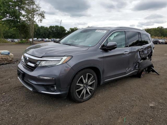 HONDA PILOT TOUR 2021 with VIN 5FNYF6H99MB048515 - Photo from auction