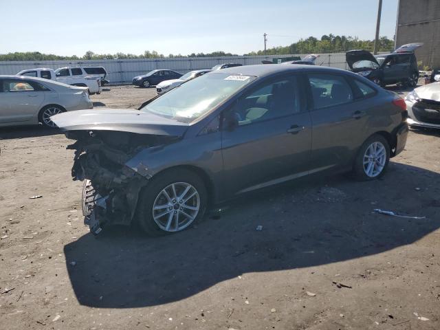 FORD FOCUS SE 2018 with VIN 1FADP3F24JL212400 - Photo from auction