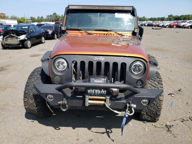 Photo 5 from auction – 2011 JEEP WRANGLER U with VIN 1J4BA3H11BL551313