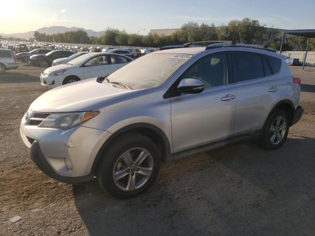 TOYOTA RAV4 XLE 2015 with VIN JTMWFREV4FJ033653 - Photo from auction