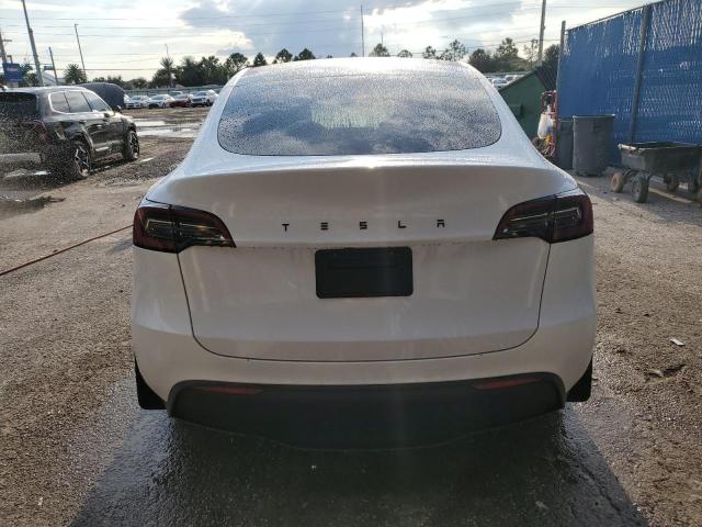 Photo 6 from auction – 2023 TESLA MODEL Y with VIN 7SAYGAEE4PF863973