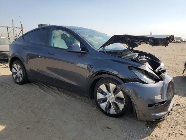 Photo 4 from auction – 2023 TESLA MODEL Y with VIN 7SAYGDEE0PF961934