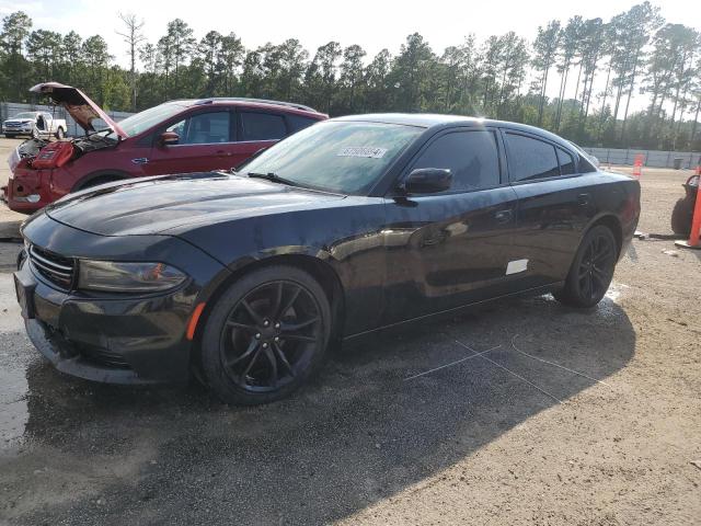 DODGE CHARGER SE 2015 with VIN 2C3CDXBG5FH768165 - Photo from auction