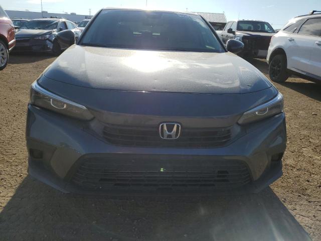 Photo 5 from auction – 2022 HONDA CIVIC EX with VIN 2HGFE1F76NH322880