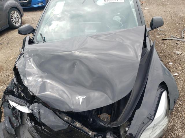 Photo 11 from auction – 2023 TESLA MODEL 3 with VIN 5YJ3E1EA3PF434012