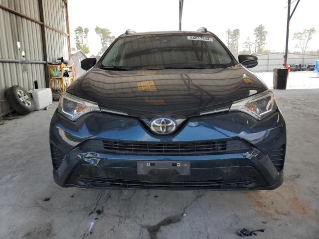Photo 5 from auction – 2017 TOYOTA RAV4 LE with VIN JTMZFREV1HJ119664