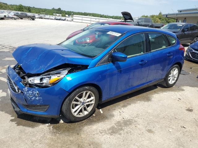 FORD FOCUS SE 2018 with VIN 1FADP3K28JL320444 - Photo from auction