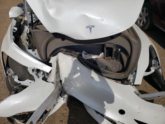 Photo 11 from auction – 2023 TESLA MODEL 3 with VIN 5YJ3E1EA7PF656715
